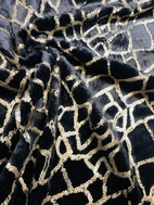 Päls med guld paljetter