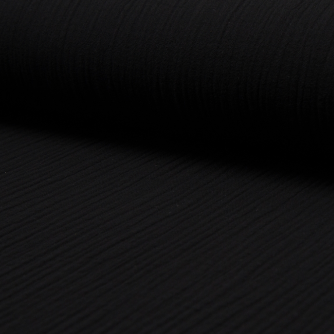 Enfärgad Muslin tyg svart