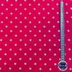 Stjärnor, cerise - Trikåtyg