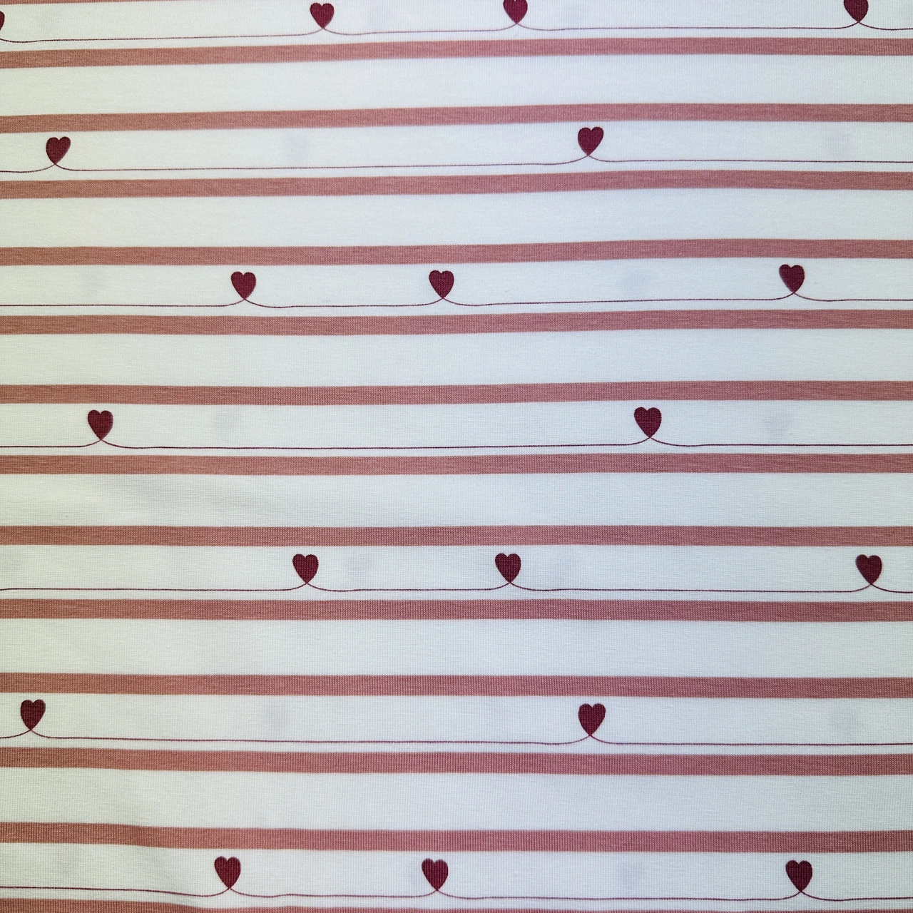 Harts on line, rose - Trikåtyg