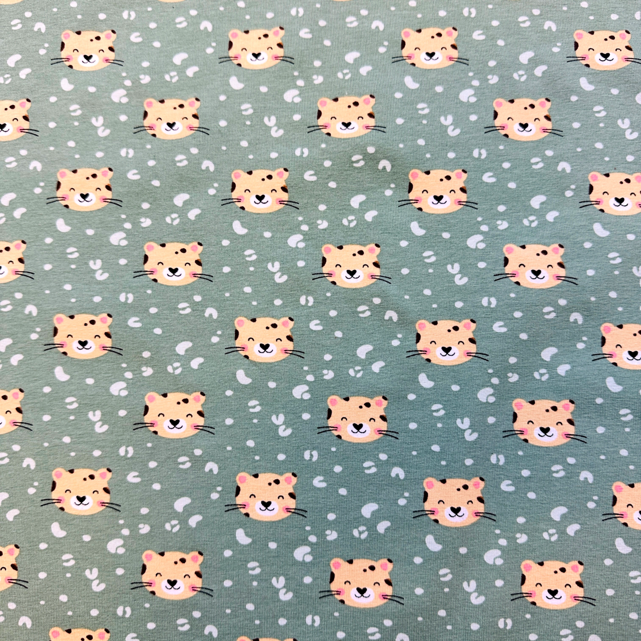 Tiger, pale green - Trikåtyg