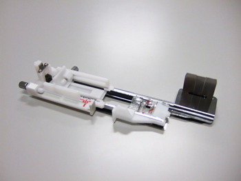 Knapphålsfot lång inkl. stabiliseringsplatta (MC15000)