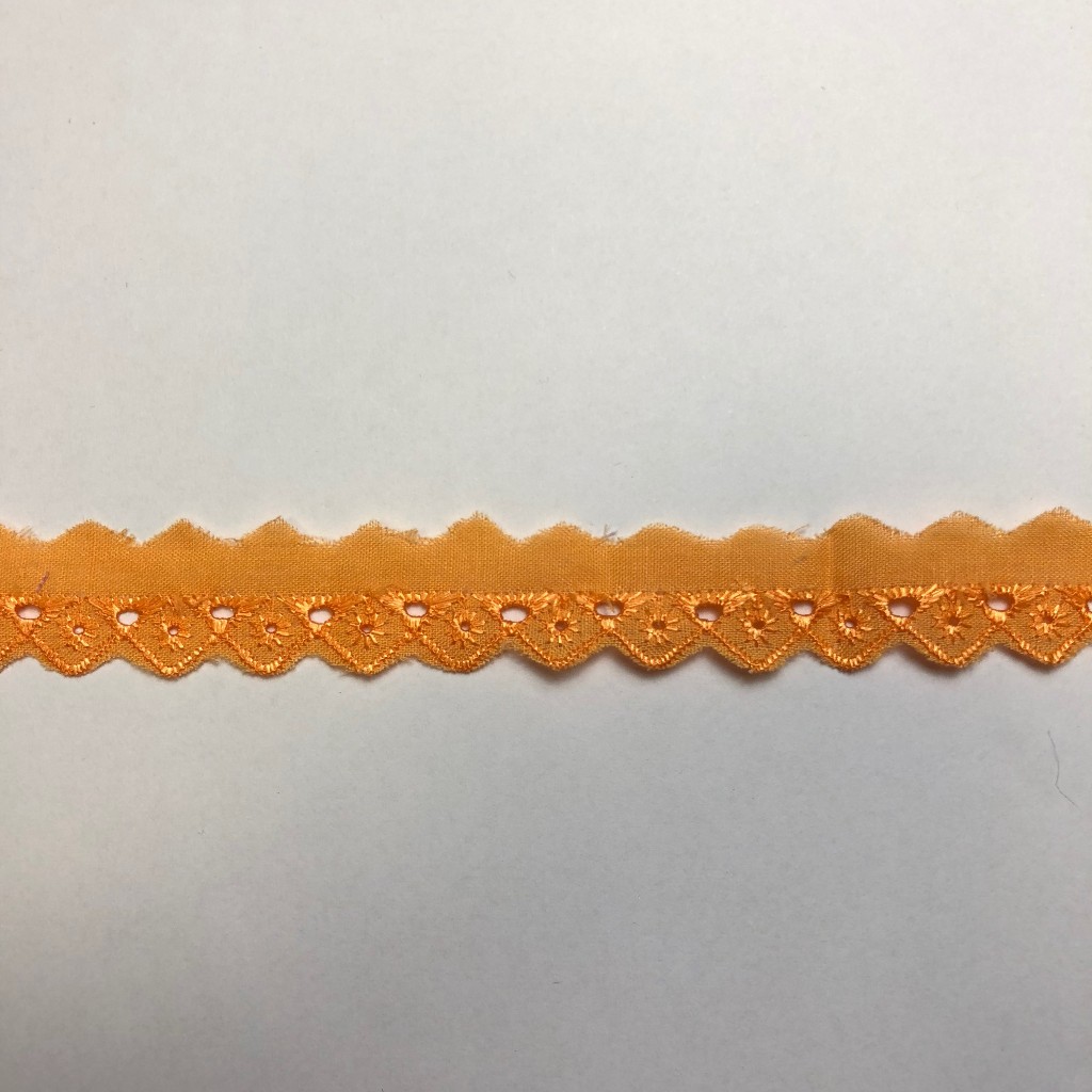 Brodyrspets Orange bunt